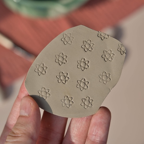 Mini clay stamp atom science design, ceramic stamp electron, pottery tool for handmade DIY creations