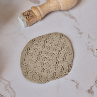 Mini ceramic tile stamp with four petal flower design, Portuguese inspired texture for clay projects
