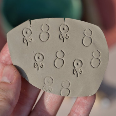 Hand-drawn alchemical clay stamp for pottery, organic ceramic texture tool for handmade surfaces
