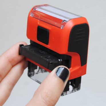 automatic stamp with your logo or image, including black ink that works on fabric
