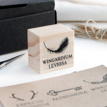 whimsical wooden stamp featuring the iconic Wingardium Leviosa spell, perfect for magical-themed crafts.