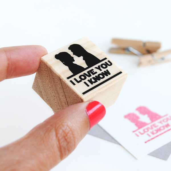 "I Love You, I Know" stamp adds a fun, nerdy touch to wedding favors, perfect for a Star Wars-themed celebration