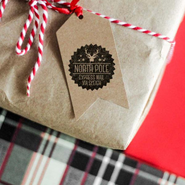 Christmas stamp North Pole. Express Mail Via Sleigh. decorate gifts with the official Santa stamp!