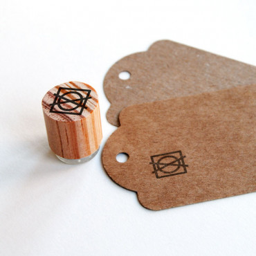 Easily stamp care symbols on fabric or cardboard tags with our versatile mini stamps.