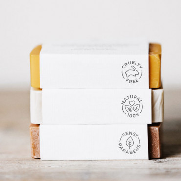 Natural cosmetics icon stamps in Catalan.