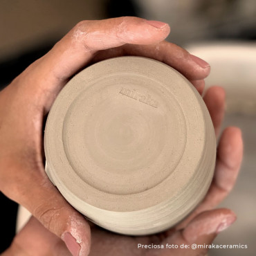 A personalized stamp for imprinting custom logos or designs on clay and ceramic items A personalized stamp for imprinting custom logos or designs on clay and ceramic items