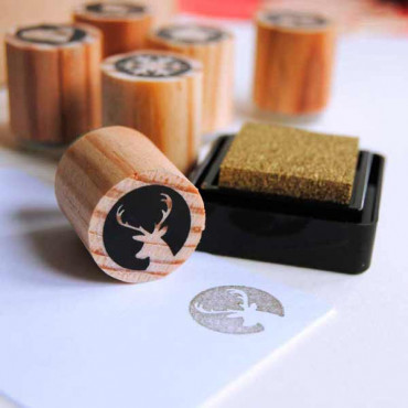 Mini rubber stamp Reindeer icon with golden ink for DIY Christmas decorations