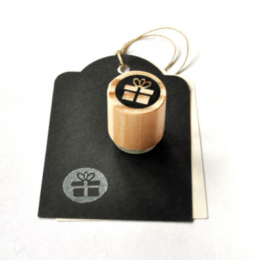 Mini gift box icon stamp for birthdays in diary or bullet journal. Portable and ideal for crafts like cards and scrapbooks.