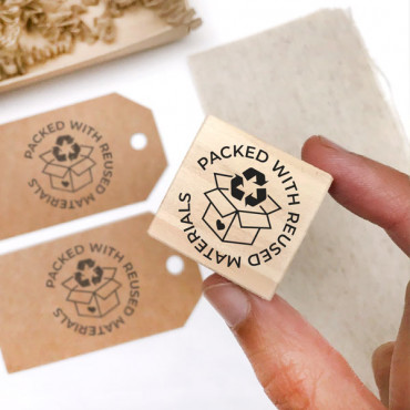 Packed with reused materials rubber stamp for reused packaging.
