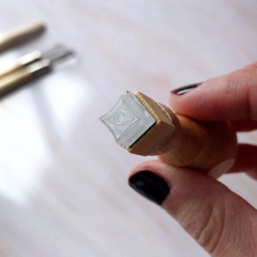 Acrylic pottery stamp with monogram inside a Curved Rhombus