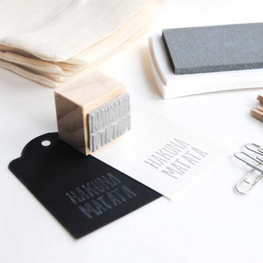 VersaCraft Cool Gray Ink pad stamped on white cardboard and black cardboard