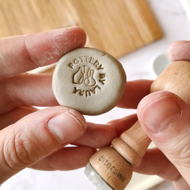 Premade clay logo stamp with custom name and three pottery vases