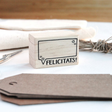 Rubber stamp "Felicitats" (Catalan) for teachers