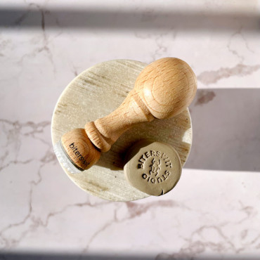 Custom pottery stamp with custom name and Egyptian beetle symbol