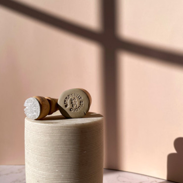 Personalized pottery stamp with name and Egyptian Beetle icon