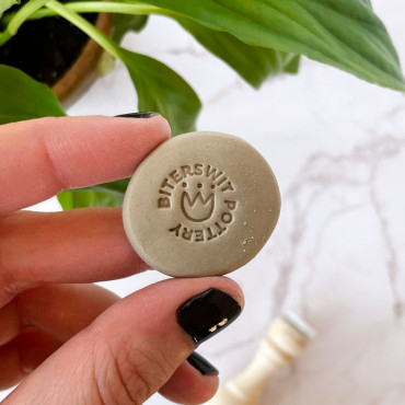 custom ceramic stamp with name and Cantuta flower minimal design