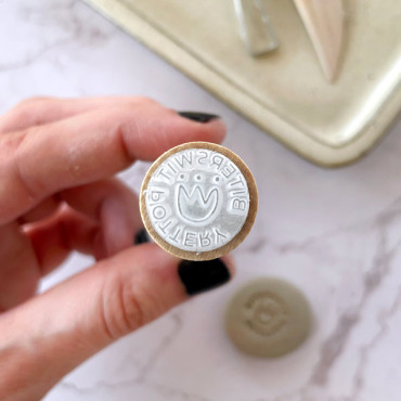 Acrylic pottery stamp with custom name and minimalistic Inca flower illustration