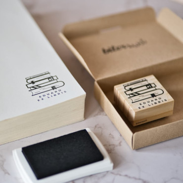 Custom bookplate stamp Library with minimalist drawing of stacked books