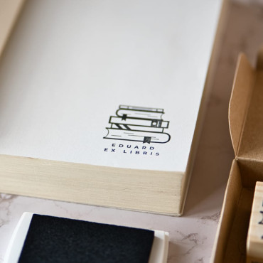 Custom ex libris stamp Library with minimalist drawing of stacked books