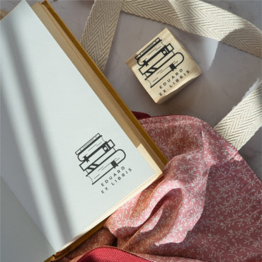 Custom bookplate stamp Library with minimalist drawing of stacked books