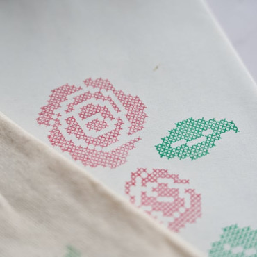 Cross stitch pattern with stamps