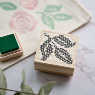 Stamps with the drawing of a leaf or a twig in cross stitch to decorate tablecloths, tote bags, cotton bags and journals