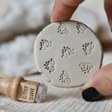 texture stamp with minimalistic lotus flower design for clay by biterswit