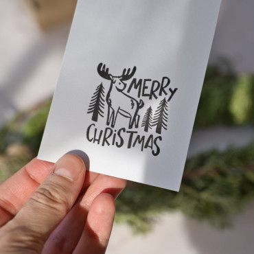 Merry Christmas rubber stamp with moose by biterswit and Sira Lobo