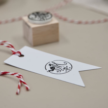 Personalized holiday gift stamp set featuring Wise Men initials and festive icons.