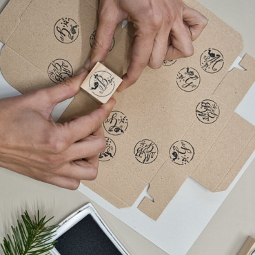 Holiday stamp set for decorating gift boxes with the initials of the Wise Men.