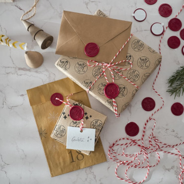 Decorative wax seals of Gaspar, Melchior, and Balthazar for festive stationery.