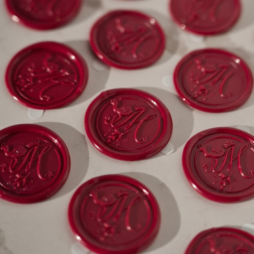 Royal-style wax seals featuring the initials of the Three Wise Men.