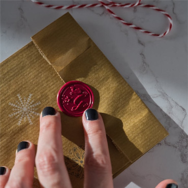 Handmade wax seals with a maroon finish, featuring the Three Magi.