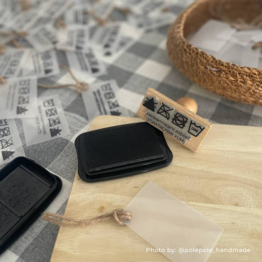 custom rubber stamp for clothing care instructions by biterswit with photo by pole pole handmade