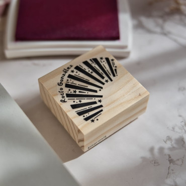 Custom bookplate stamp with twinkling stars and rays. A unique touch for your library.