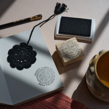 Unique book stamp with a Scandinavian snowflake design—ideal for bookworms.