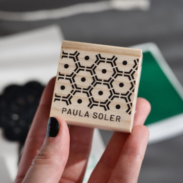 Close-up of the hexagon library stamp with a honeycomb design and customizable text for a personal touch.