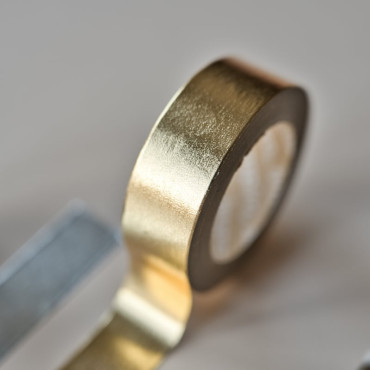 Gold foil finish washi tape for adding a touch of sparkle to your crafts.