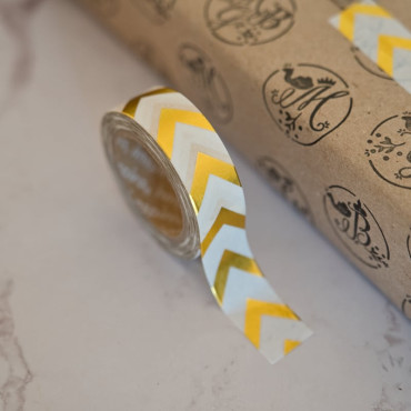 Golden arrow tape for adding a decorative touch to crafts, gifts, and more.