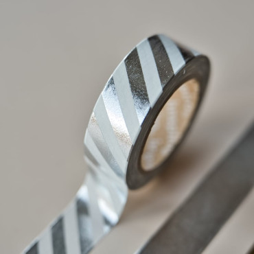 Stylish silver and white washi tape for scrapbooking, photo albums, gift wrapping, and more with a shiny foil finish.