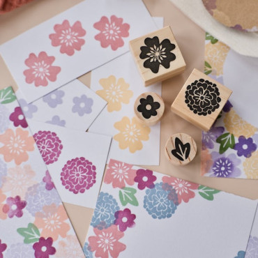 Various floral prints made with the botanical stamps, showcasing different ink colors and creative possibilities.