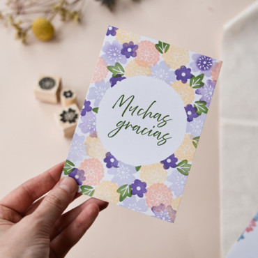 Hand holding a "Thank You Very Much" botanical DIY postcard, featuring a beautiful floral design for special occasions.