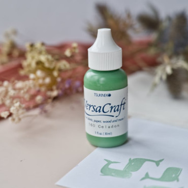 Soft pale green ink refill for stamping on cotton, paper, cardboard, and unfinished wood.