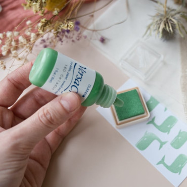 Celadon refill ink for standard and mini pads. Water-based and heat-set for fabric use.