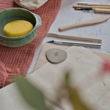 Personal clay stamp for ceramic signature with elegant vertical monogram design
