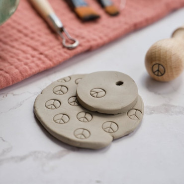 Mini clay stamp with peace symbol, mindful tool for positive crafting and handmade decor