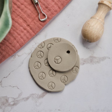 Peace icon texture stamp for clay crafts, perfect for spiritual gifts and ceramic class fun